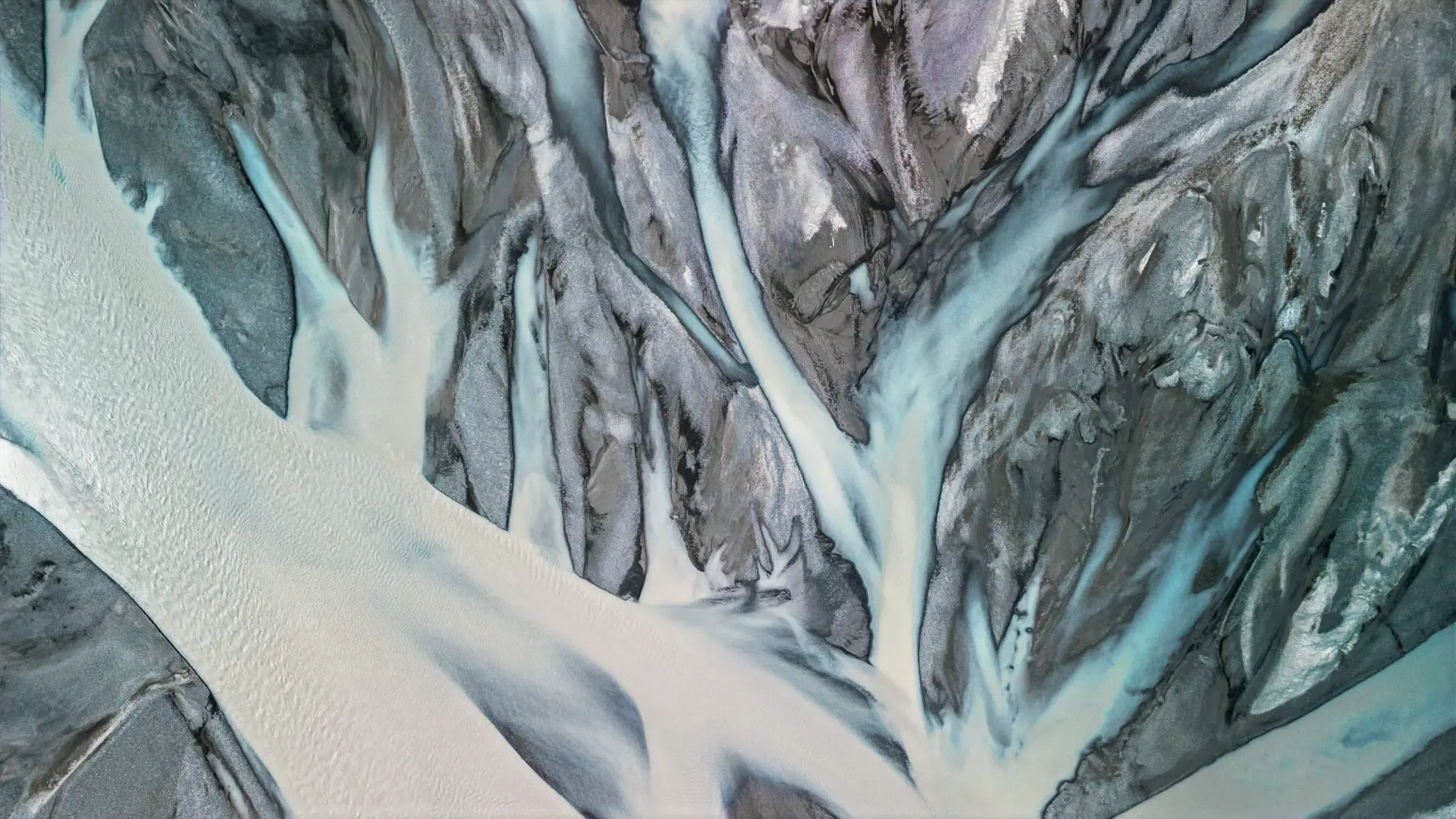 Braided glacial rivers flowing through volcanic terrain